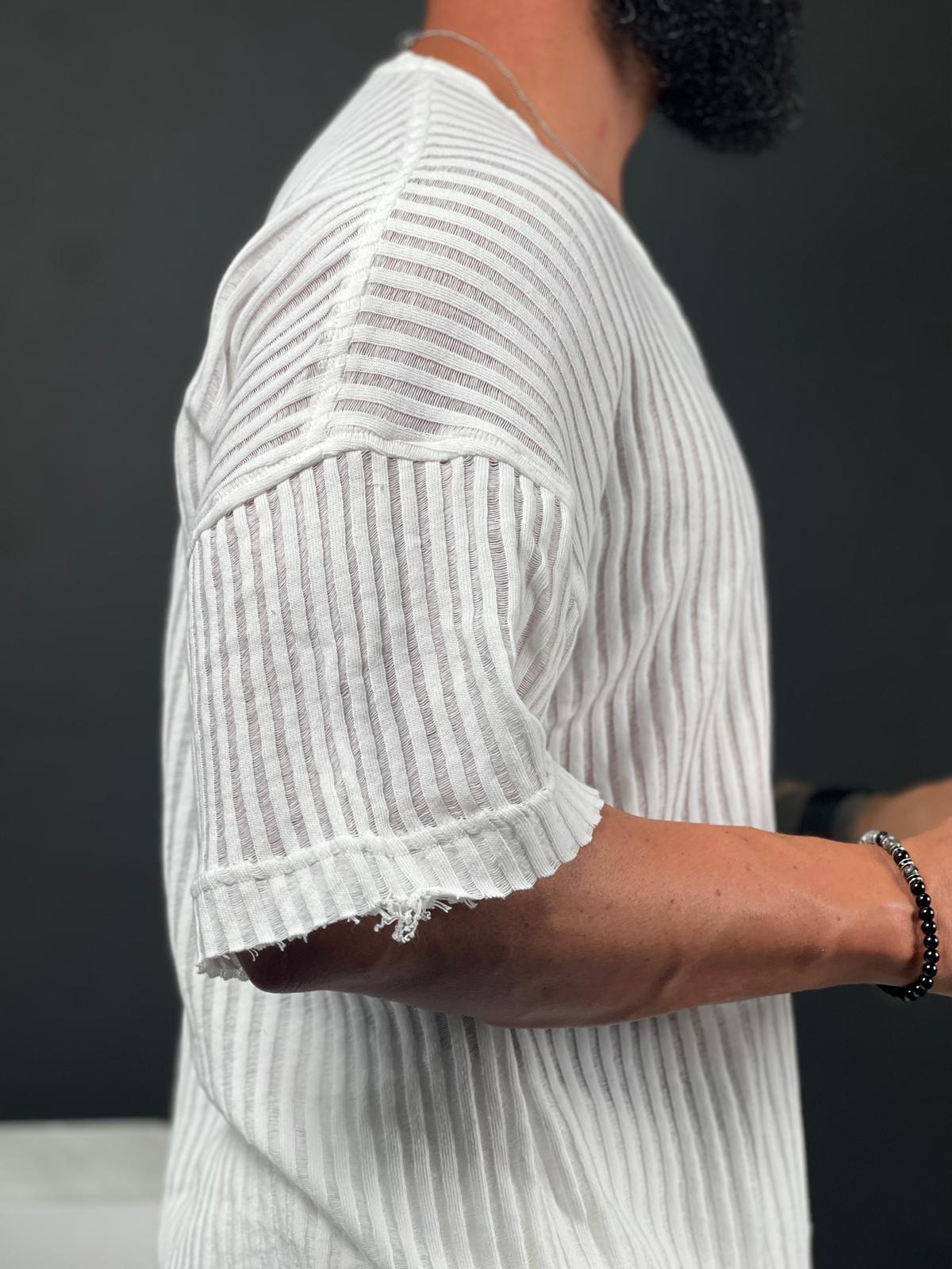 Oversized short-sleeve shirt with a rounded neckline made from striped linen fabric.