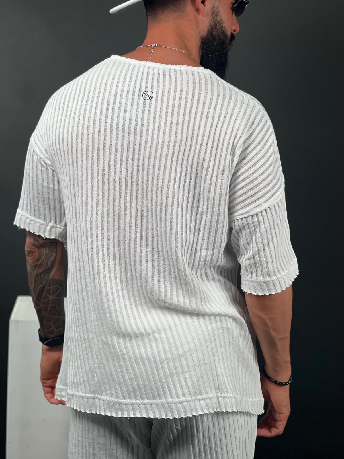 Oversized short-sleeve shirt with a rounded neckline made from striped linen fabric.