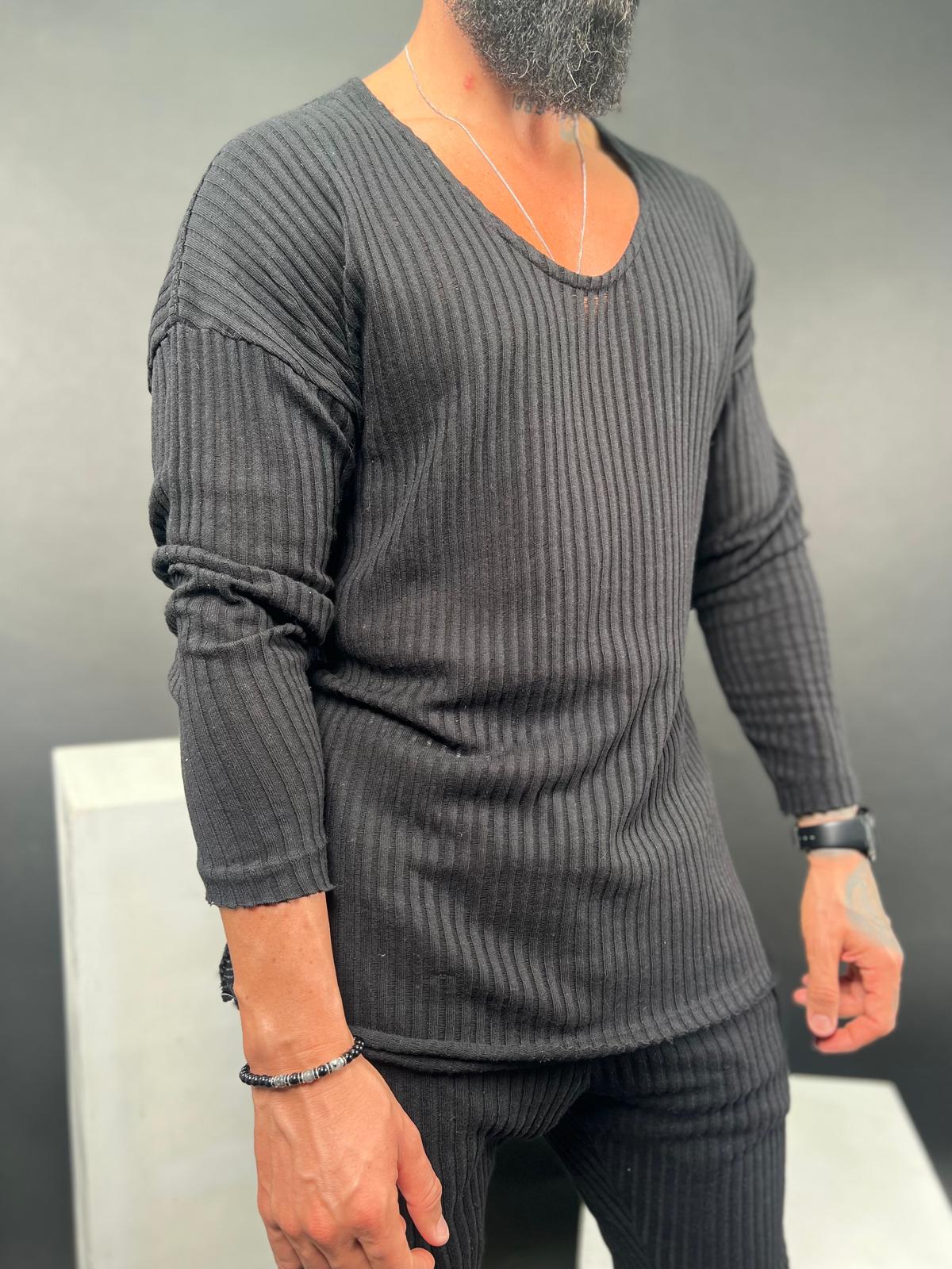 A shirt made from striped linen fabric, with an open collar and long sleeves.