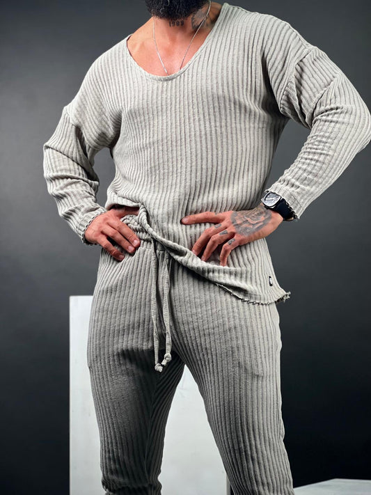 A shirt made from striped linen fabric, with an open collar and long sleeves.